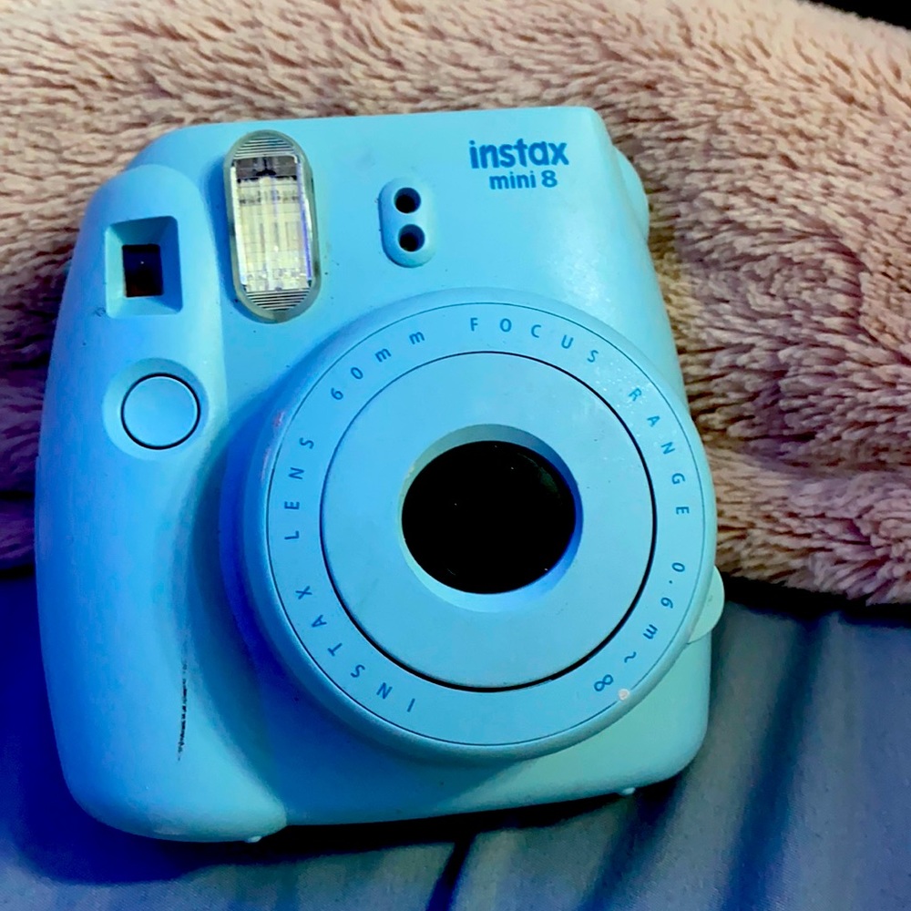 Blue poloroid camera